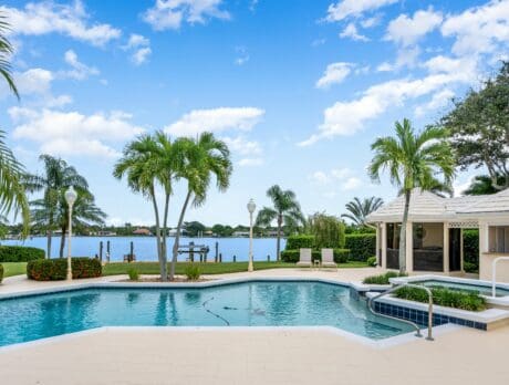 Enjoy island living at its finest in Moorings home with deepwater dock