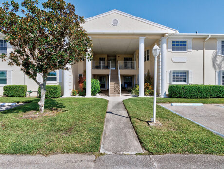 Charming Grove Isle condo overlooks nature preserve