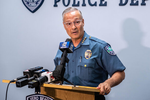 Wet clothes, note, empty holster found in truck of double homicide suspect; warrant issued