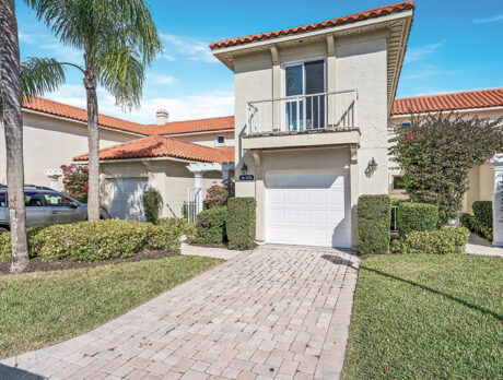 Charming Grand Harbor townhome has extensive upgrades