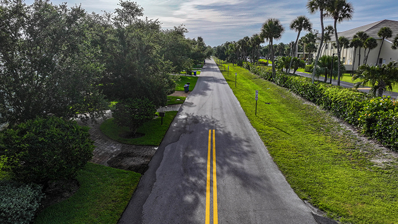 After years of residents’ pleas, council approves sidewalk for island’s Iris Lane