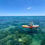 Angela on her paddleboard photo 6